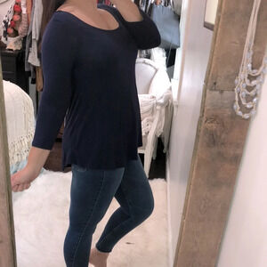 Sweet Tea’s size medium navy blue flowy top